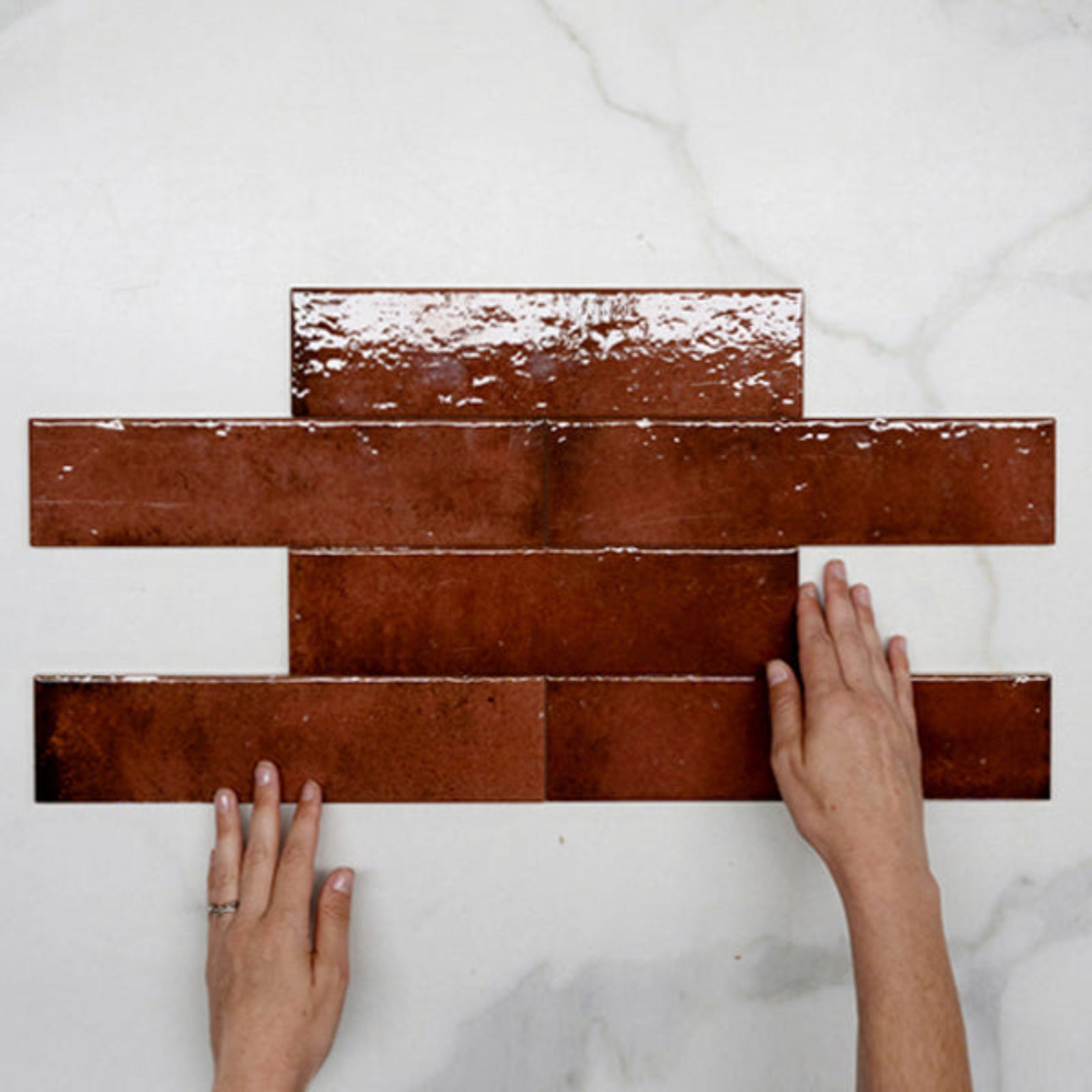 Pattern With Hand Antique Red Andrea Subway Tile Textural Gloss 75 x 300 x 8mm Italian Porcelain  - The Blue Space