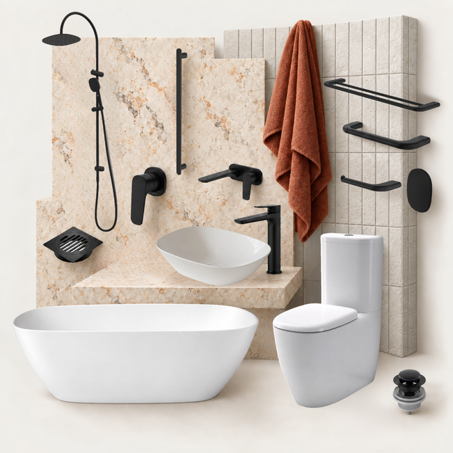 Modern bathroom fixtures set including a freestanding white bathtub, vessel sink with matte black faucet, wall-mounted shower system, toilet, towel rack, and drain, arranged against beige stone and tile walls with a rust-colored towel.