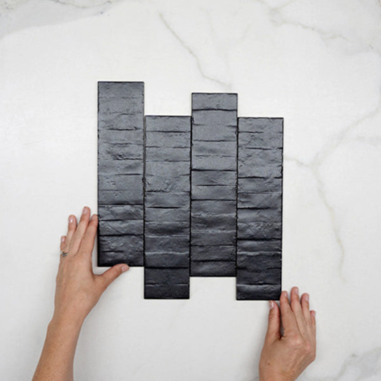 Pattern With Hand Charcoal Olivia Feature Subway Matte 75 x 300mm Porcelain  - The Blue Space