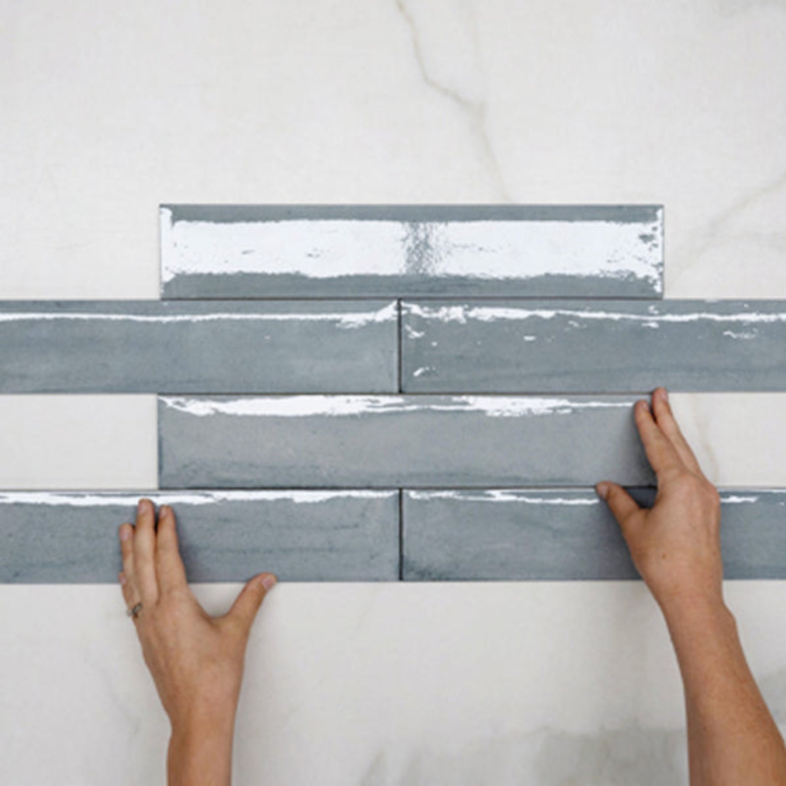 Pattern With Hand Dove Grey Theo Subway Tile 75 x 400mm Italian Porcelain  - The Blue Space