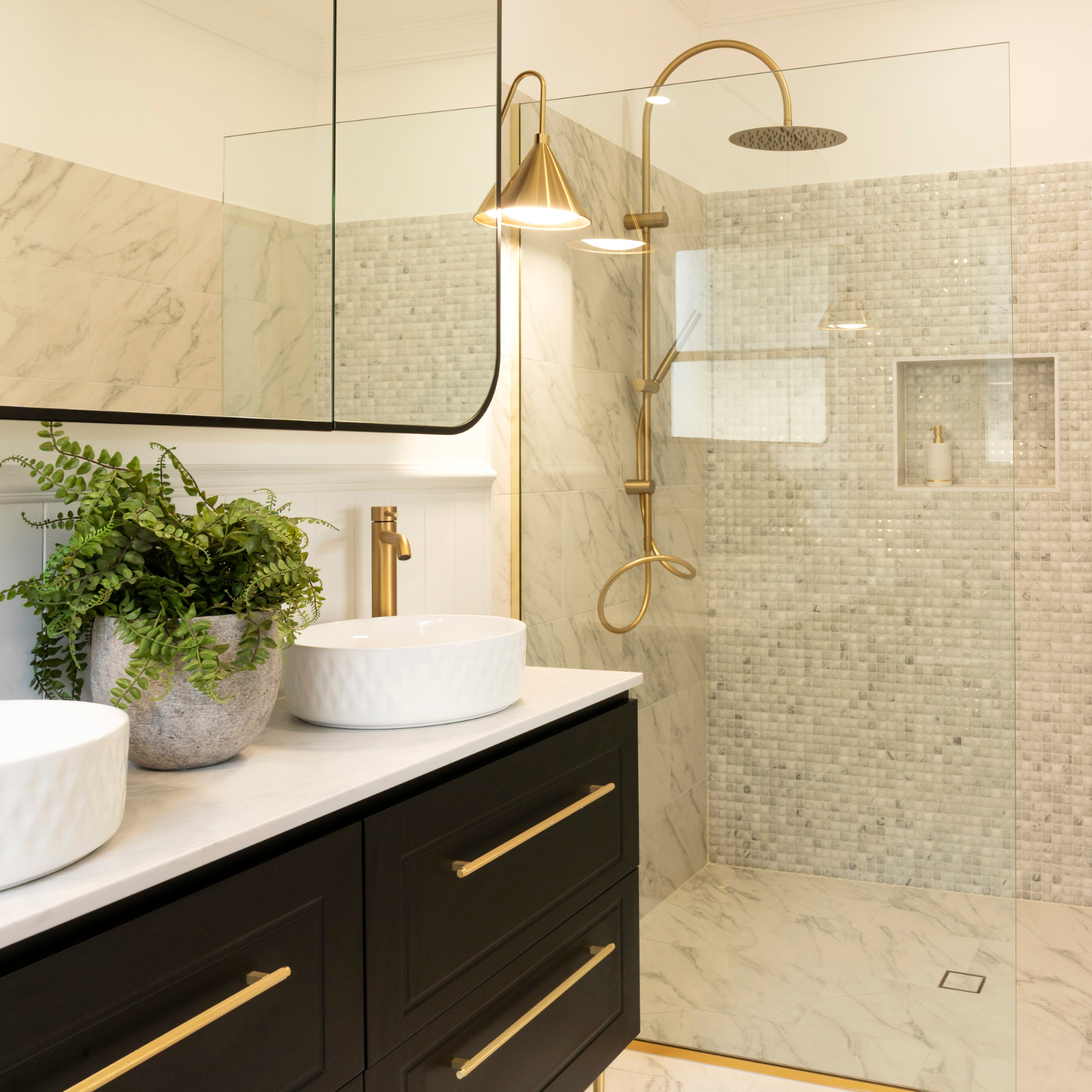 Selling houses australia Fitzroy north project - brushed brass tapware, shower and accessories.