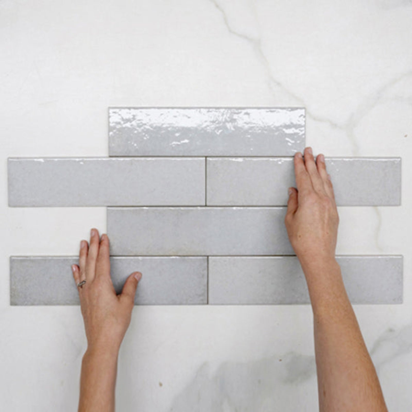 Pattern With Hand Light Grey Andrea Subway Tile Textural Gloss 75 x 300 x 8mm Italian Porcelain  - The Blue Space