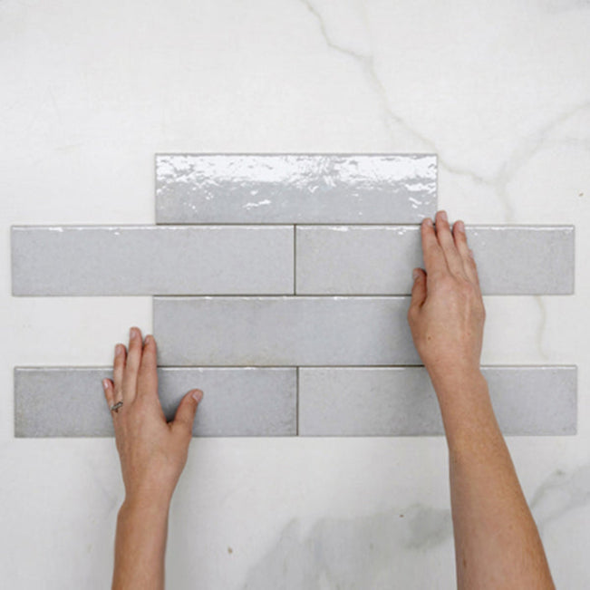 Pattern With Hand Light Grey Andrea Subway Tile Textural Gloss 75 x 300 x 8mm Italian Porcelain  - The Blue Space