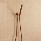 Meir Round Hand Shower on Swivel Bracket Lustre Bronze in bathroom lifestyle image