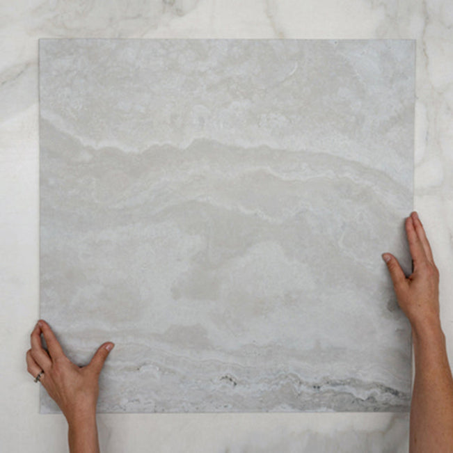 With Hand Pearl Ivy Vein Cut Travertine Look Tile Tech Grip 600 x 600 x 10mm Porcelain  - The Blue Space