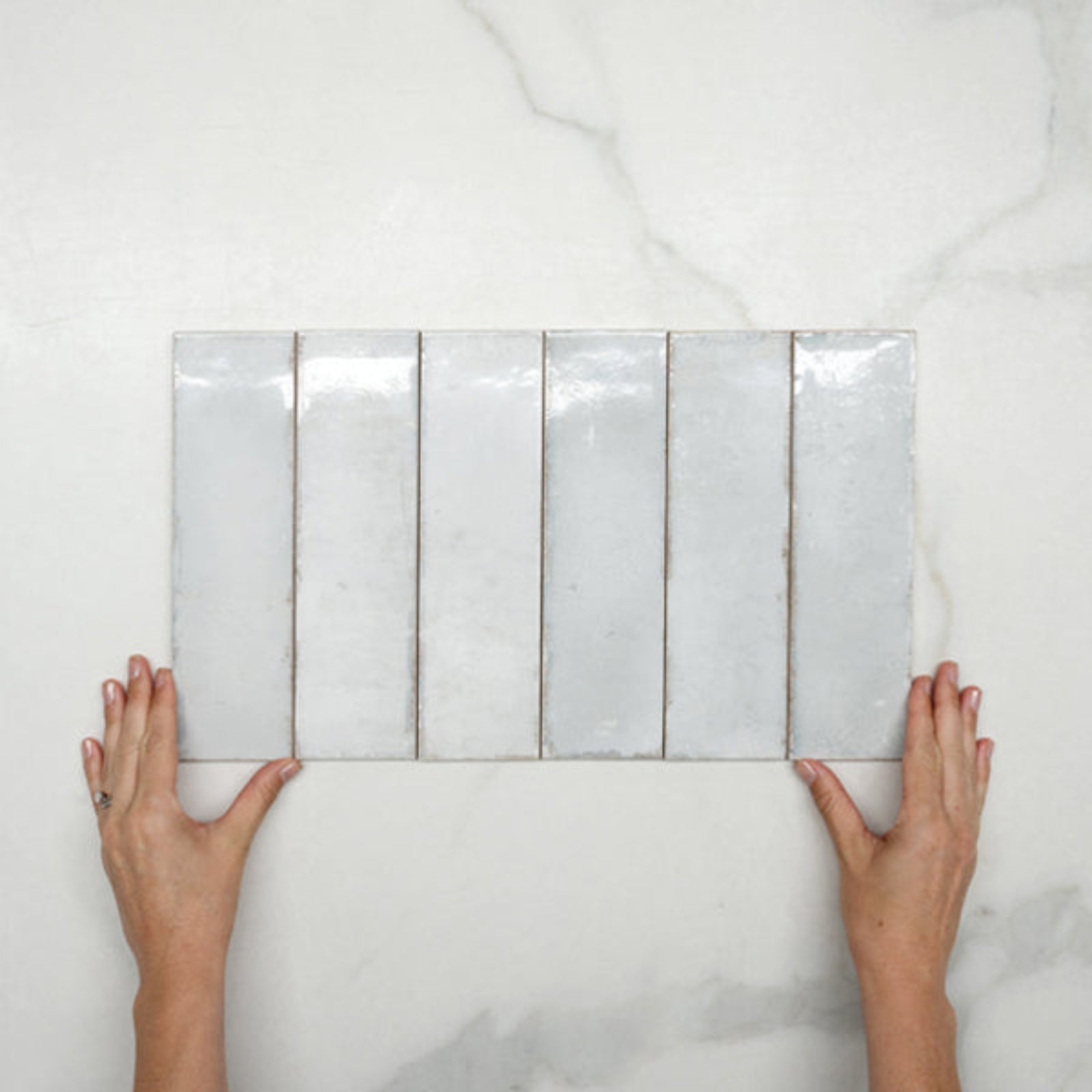 Faces With Hand Pearl White Leon Spanish Subway Tile Gloss 69 x 240mm Ceramic  - The Blue Space