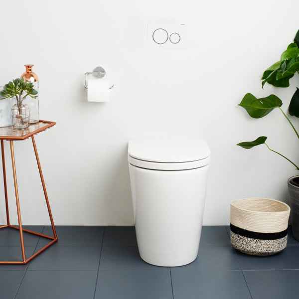 Caroma Liano Easy Height Cleanflush Toilet Suite with Geberit Sigma 8 In Wall Cistern. Pictured with white Geberit Concealed Cistern Buttons in Modern Bathroom - The Blue Space