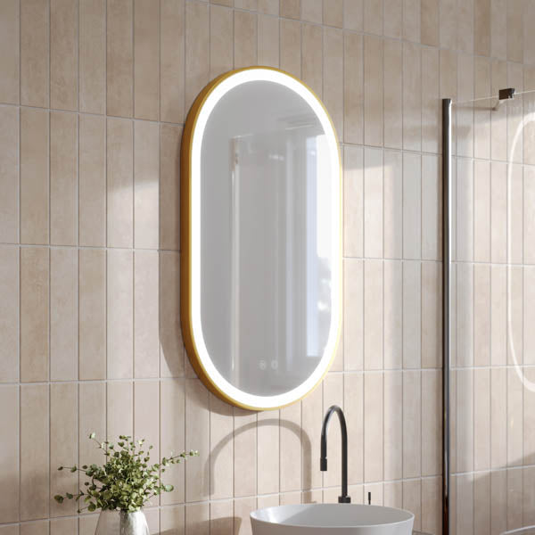 INDOM5085-BB | Ingrain 500mm by 850mm Pill Shaped Frontlit Mirror with Touch Sensor and Demister Pad with Brushed Brass Frame