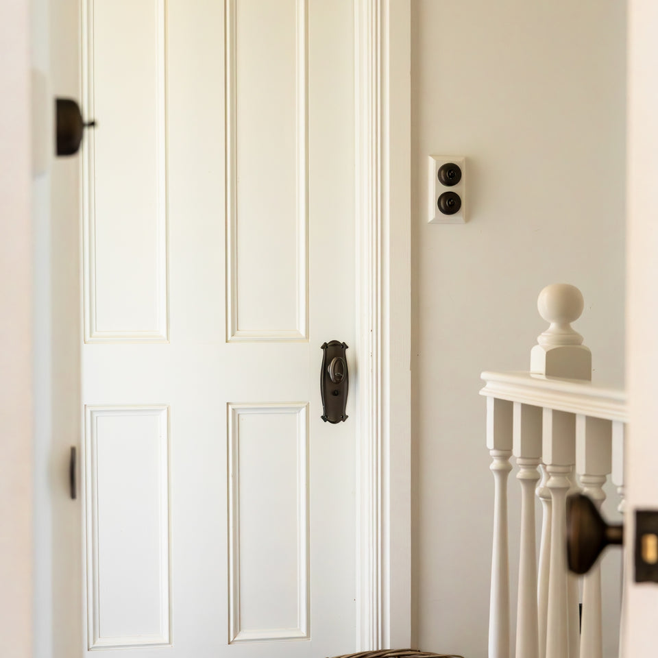 TradCo Bungalow Door Knob Long Backplate Passage Set Antique Brass