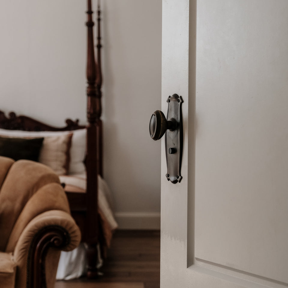 TradCo Bungalow Door Knob Long Backplate Privacy Set Antique Brass