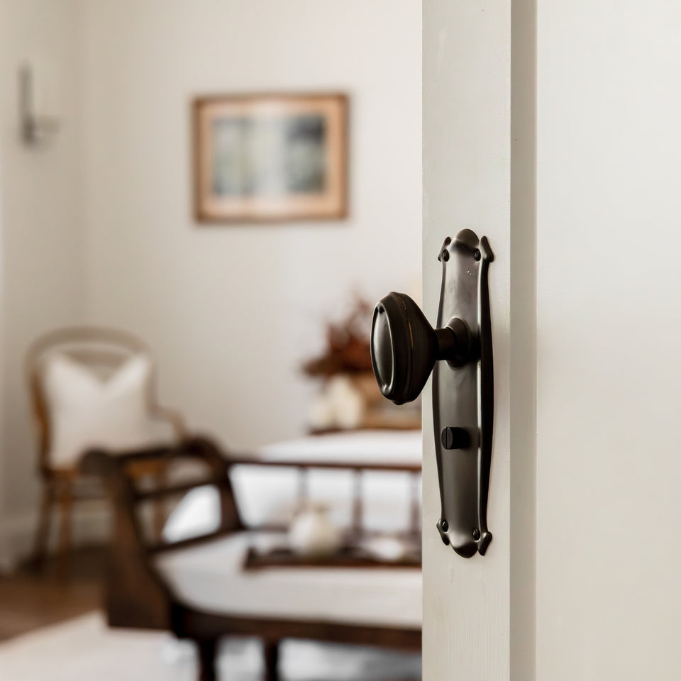 TradCo Bungalow Door Knob Long Backplate Privacy Set Antique Brass