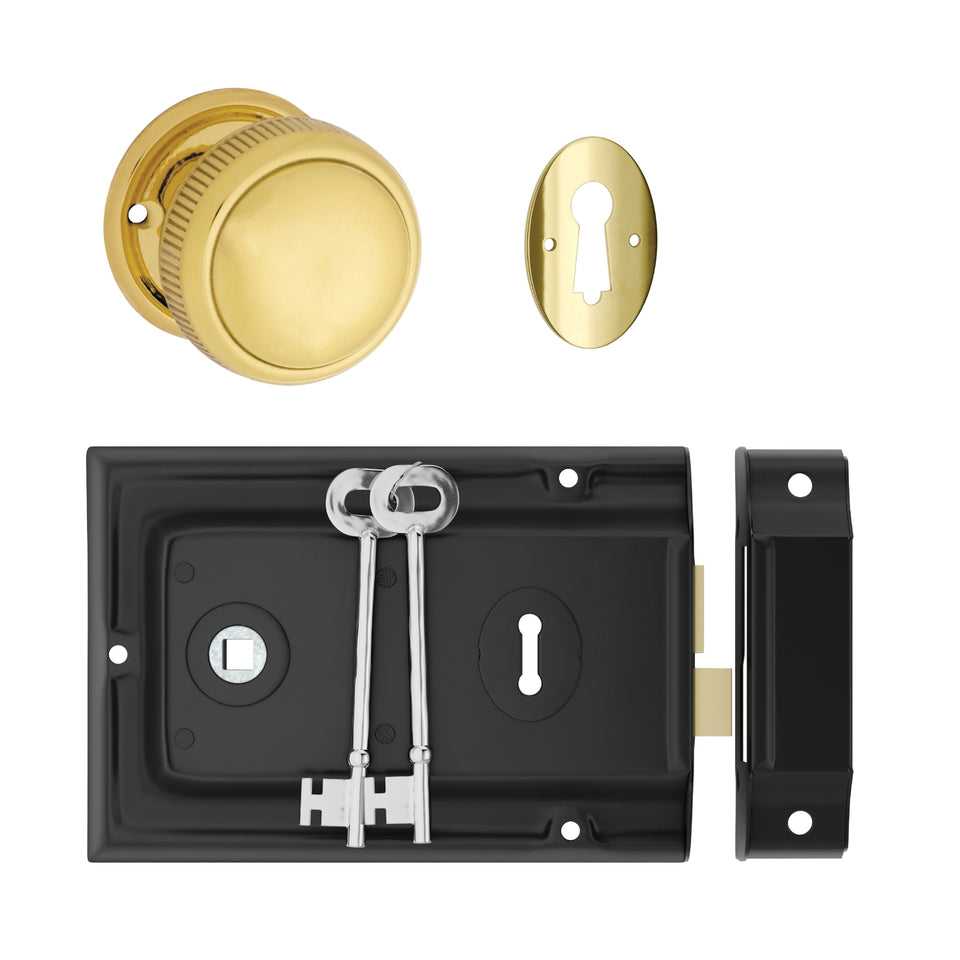 TradCo Rim Lock and Milled Edge Knob Passage Set Matte Black/Polished Brass