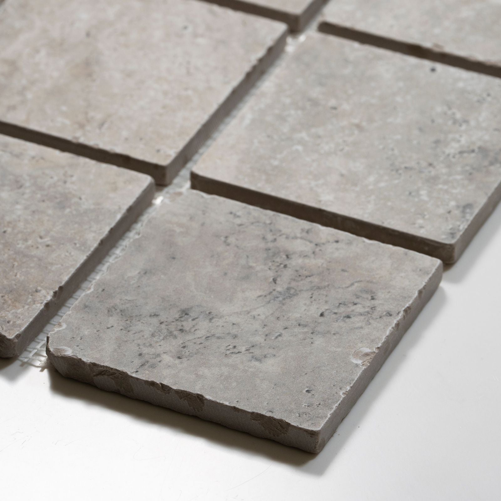 Oblique Valerie Grey Travertine Straight Bond Cobblestone Porcelain Tile Sheets TRVPETGCOBST - The Blue Space