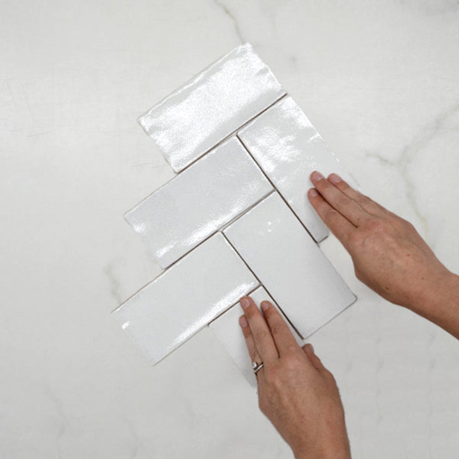 Fishbone With Hand White Dianna Hand Made Subway Tile 75 x 150 x 9mm Spanish Ceramic  | The Blue Space