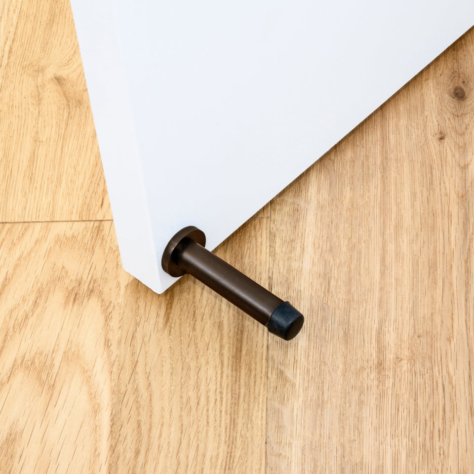 Zanda Skirting Fix Door Stop Ember Bronze