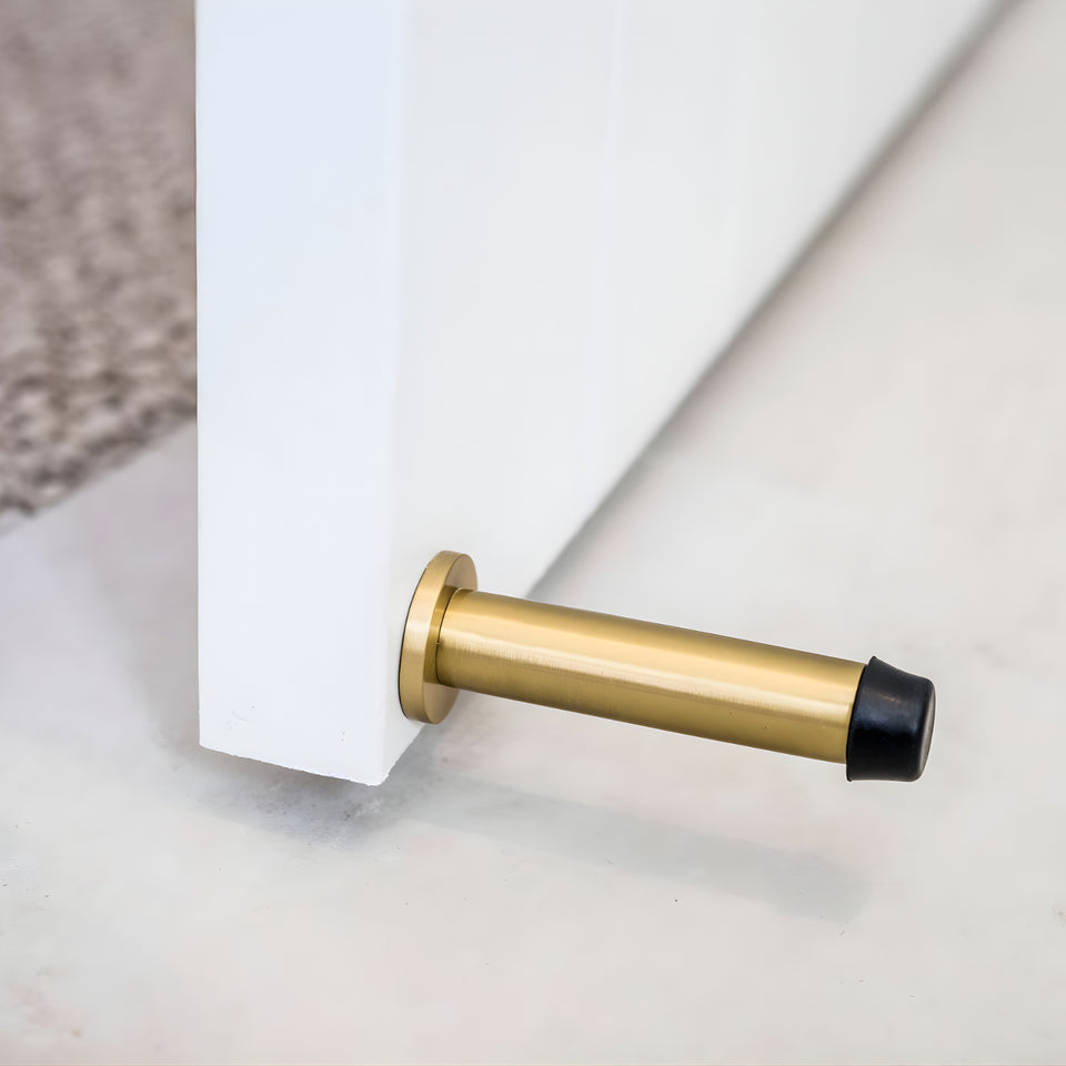 Zanda Skirting Fix Door Stop Satin Brass
