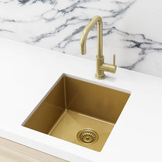 Meir Single Bowl PVD Kitchen Sink 440mm - Brushed Bronze Gold Featured in a Kitchen on a White Benchtop with a Marble Splashback- The Blue Space
