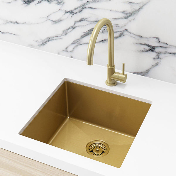 Meir Single Bowl PVD Kitchen Sink 450mm - Brushed Bronze Gold Featured on a White Kitchen Benchtop with Marble Splashback and Rounded Off Sink Mixer - The Blue Space