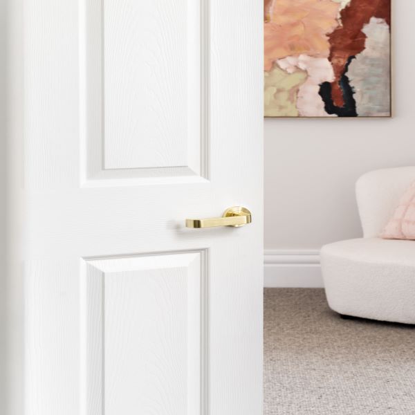 Zanda Futura Streamline Passage Set Satin Brass on white internal door - Brass door handles online at the Blue Space
