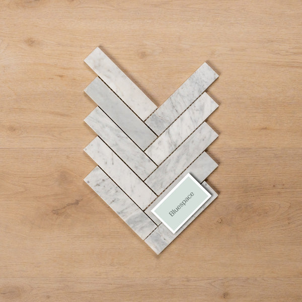Sample of Cottesloe Carrara White Herringbone Honed Marble Mosaic Tile - The Blue Space