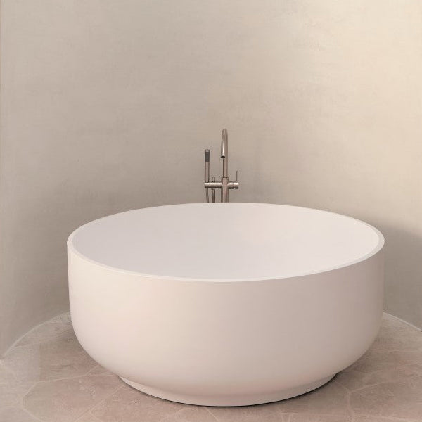Calming Bathroom with Round Bath, Featuring the Meir Freestanding Round Bath Mixer with Hand Spray - Champagne Online at The Blue Space