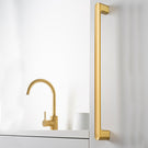 Momo Handles Luv D Handle Brushed Gold Lifestyle Image in Kitchen | The Blue Space
