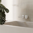 Phoenix Nuage Bath Spout in White pictured with Nuage Wall/Shower Mixer