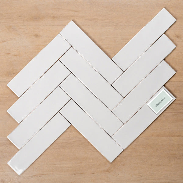 Riviera White Gloss 75x300mm Herringbone Pattern - The Blue Space