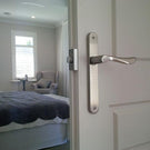 Zanda Juno Longplate Handle Passage Set Satin Chrome on bedroom door