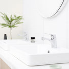 Dorf Kip Basin Mixer Featured in a Bathroom On a White Semi-Inset Basin - The Blue Space