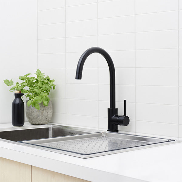 Dorf Poseidon Sink Mixer-Matte Black Featured in a Kitchen On a White Benchtop - The blue Space