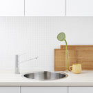 Dorf Villa Sink Mixer Featured in a Kitchen with a Round Kitchen Sink, and White Benchtop and Cabinetry - The Blue Space
