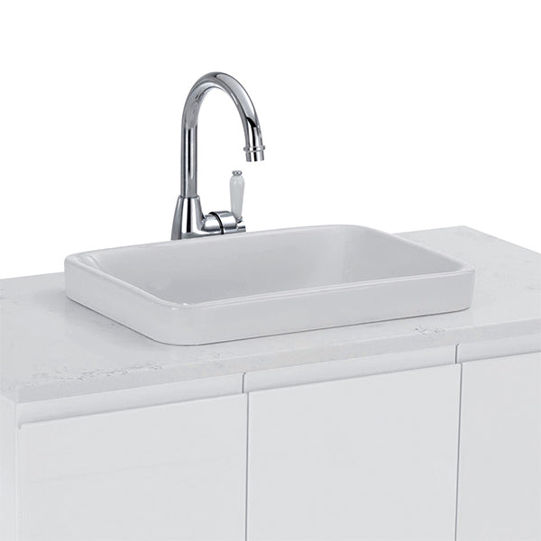 Fienza Eleanor Gooseneck Basin Mixer - Chrome/Ceramic on a white vanity with white basin