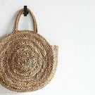 Indigo Ciara Wall Hook Matte Black - rattan bag hanging from designer wall hook for the home | The Blue Space