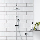 Methven Krome 100 3 Function Twin Shower System with white subway tiles - The Blue Space