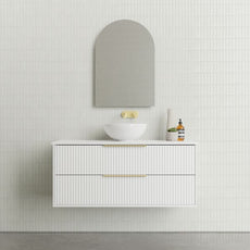 Marquis Lake Wall Hung Vanity 1200mm in Symphony Blanco top, White finish, gloss white basin, brushed brass basin mixer and top-pulled handle features arch mirror in modern bathroom design - The Blue Space