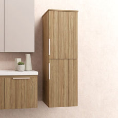 Marquis Spring Tide Tallboy in Coastal Oak cabinet finish and brushed brass top pull handle in modern bathroom design - The Blue Space