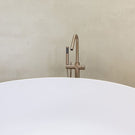 Meir Pinless Round Freestanding Bath Spout and Hand Shower Champagne in Modern Bathroom Design - The Blue Space