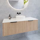 Timberline Elwood Wall Hung Vanity 1200mm With Above Counter Basin in Prime Oak finish, Matte Black basin mixer and matte black top-pulled handle features round mirror in modern bathroom design - The Blue Space