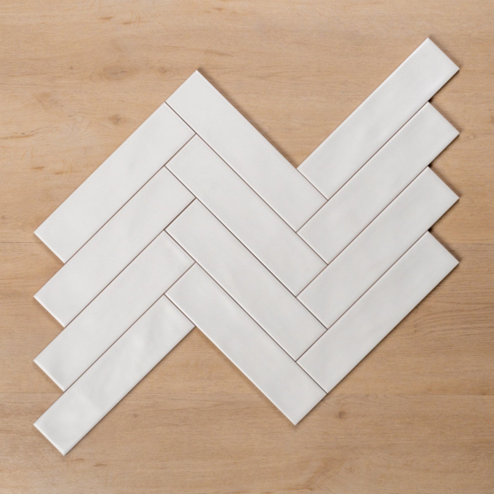Herringbone Whitehaven White Wavy Satin Ceramic Subway Tile 68x280mm HAMWHS13 - The Blue Space